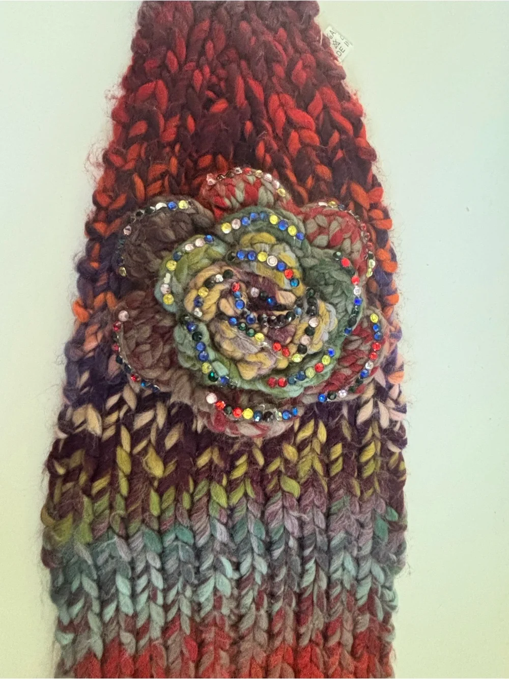 Handcrafted Multicolor Knit Ear Warmer Headband with Floral Accent